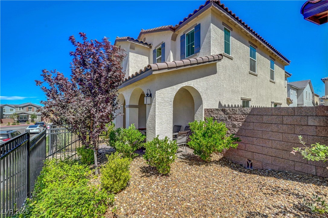 3637 Modico Lane Henderson, NV 89044 - Photo 6 of 62 Mediterranean / spanish house featuring stucco sid