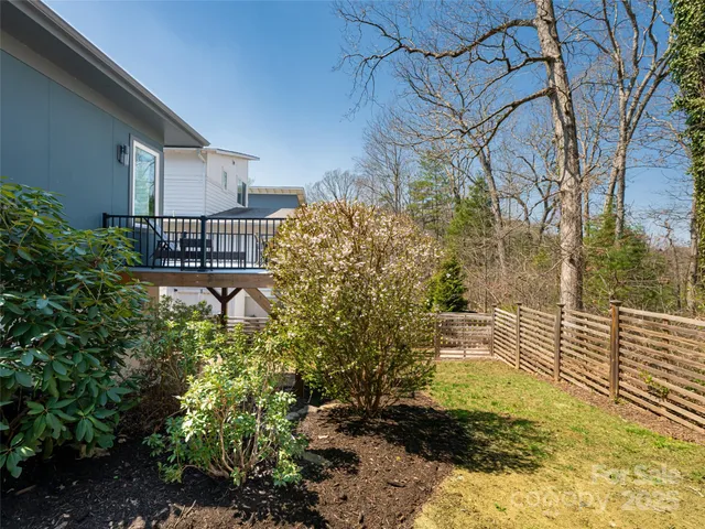 an aerial view of a house with a lot of residential buildings