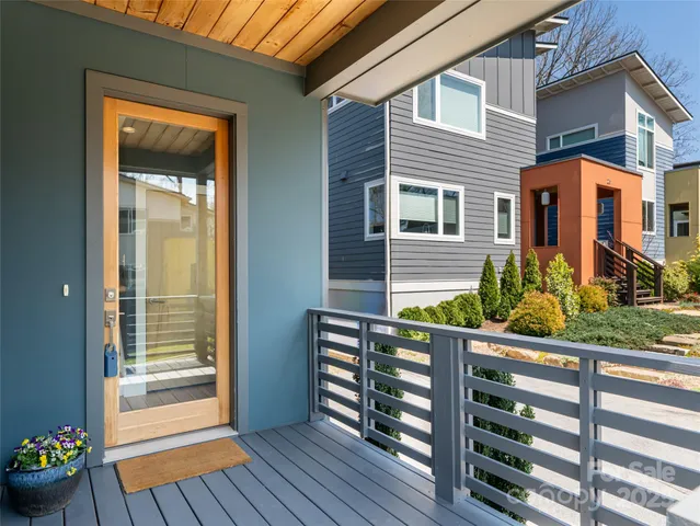 a front view of a house with a porch