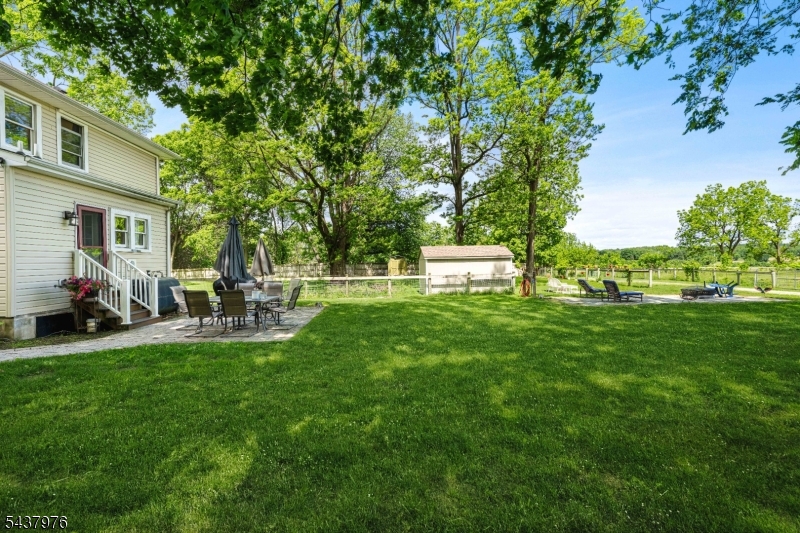 886 Brass Castle Road Belvidere, NJ 07823 - Photo 34 of 44 a view of a house with backyard sitting area and garden