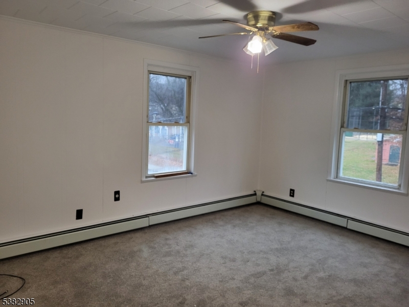 56 Maple Avenue, Unit 2 Rockaway, NJ 07866 - Photo 8 of 8 an empty room with a window