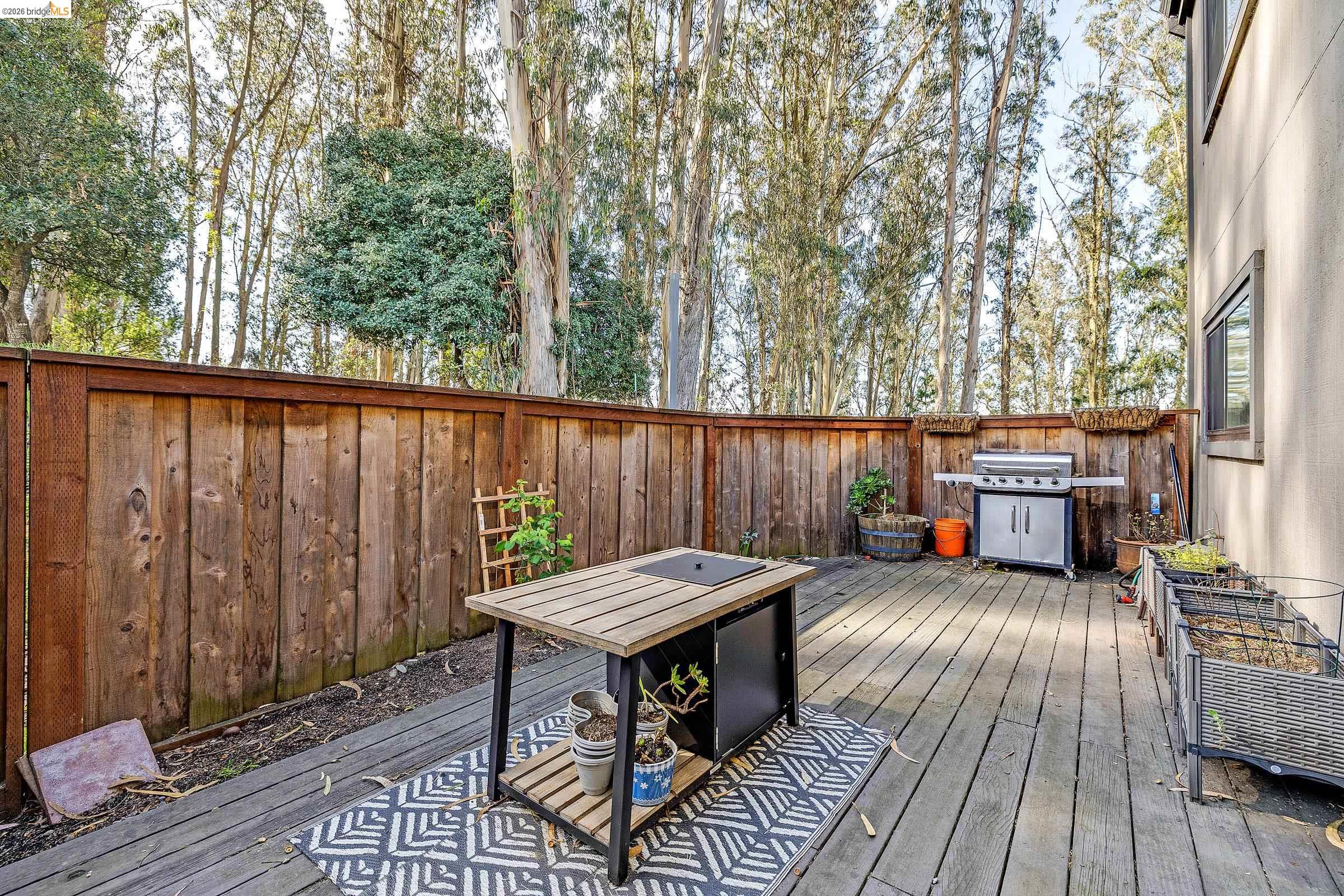 407 Vista Heights Road El Cerrito, CA 94530 - Photo 12 of 29 Wooden terrace featuring a fenced backyard and area for grilling