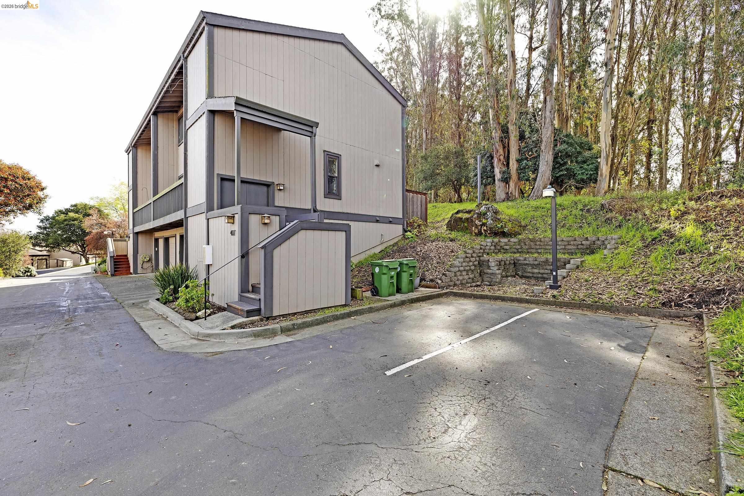 407 Vista Heights Road El Cerrito, CA 94530 - Photo 25 of 29 View of front of house featuring uncovered parking