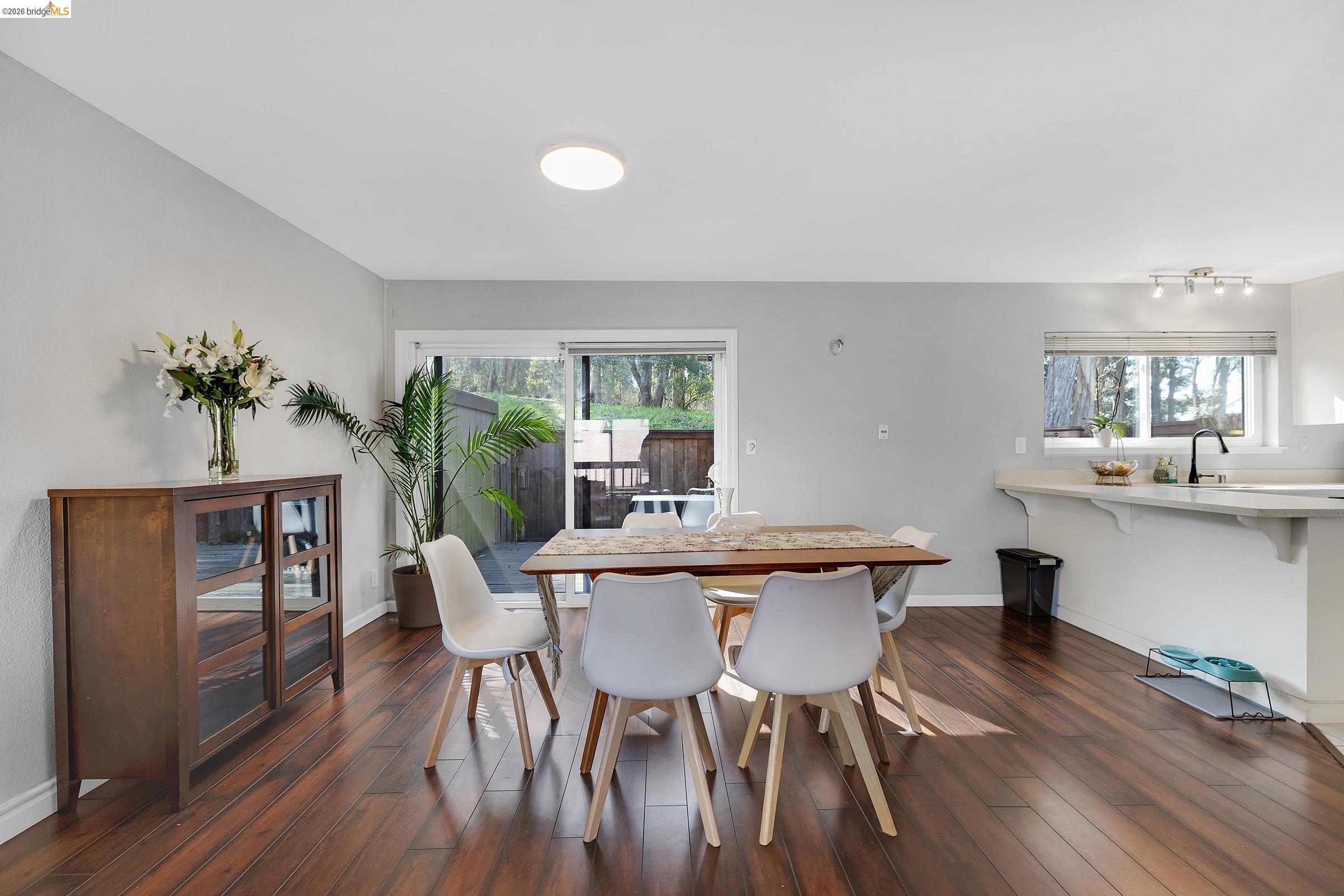 407 Vista Heights Road El Cerrito, CA 94530 - Photo 9 of 29 Dining space featuring baseboards and dark wood-style flooring