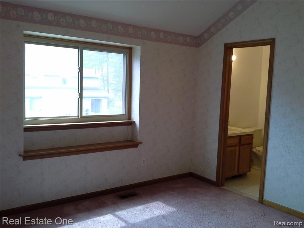 2577 South Commerce Road, Unit 11 Wolverine Lake, MI 48390 - Photo 21 of 57