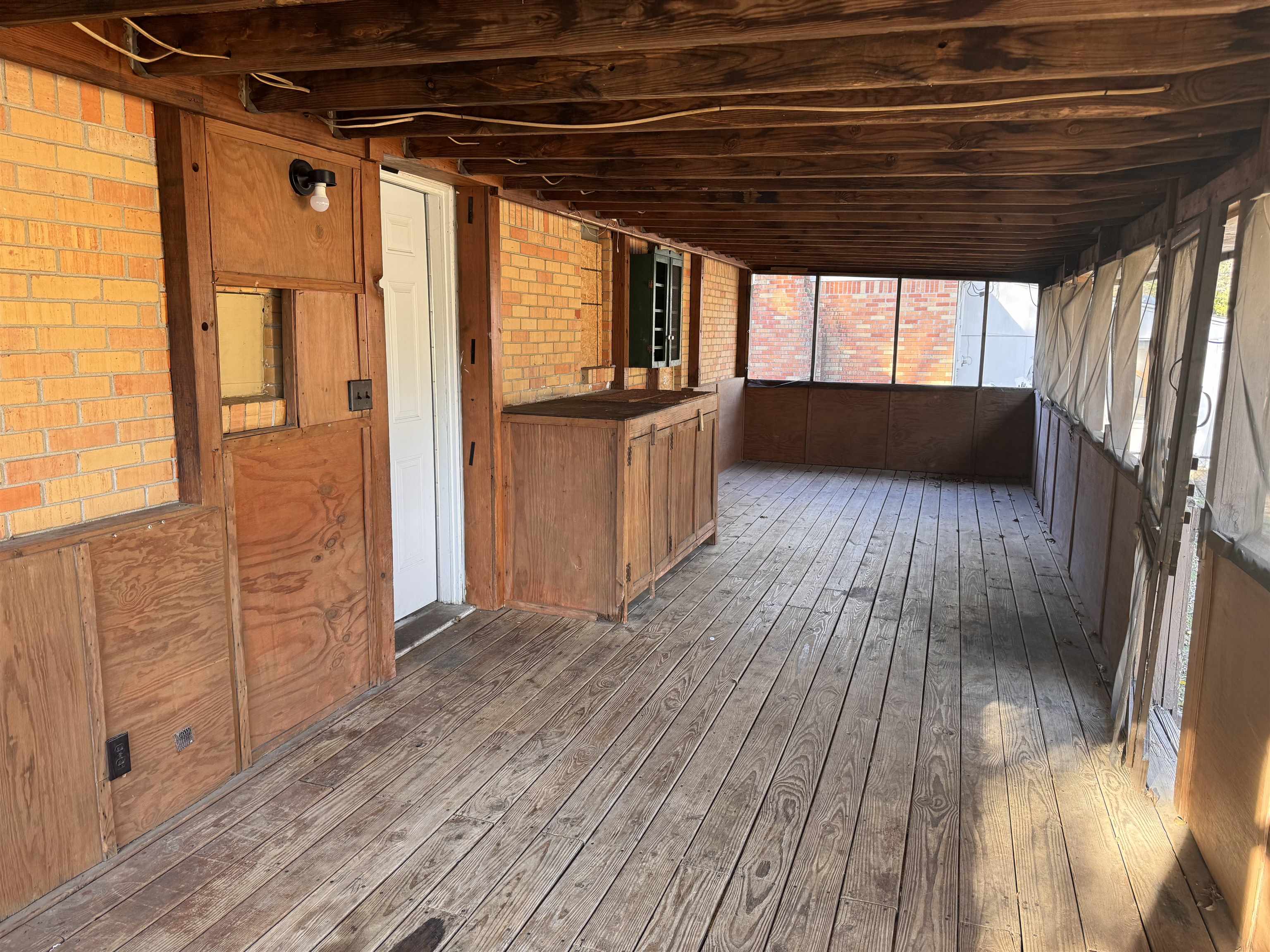 3788 Bishops Bridge Road Memphis, TN 38118 - Photo 19 of 22 a view of a room with wooden floors and wooden walls