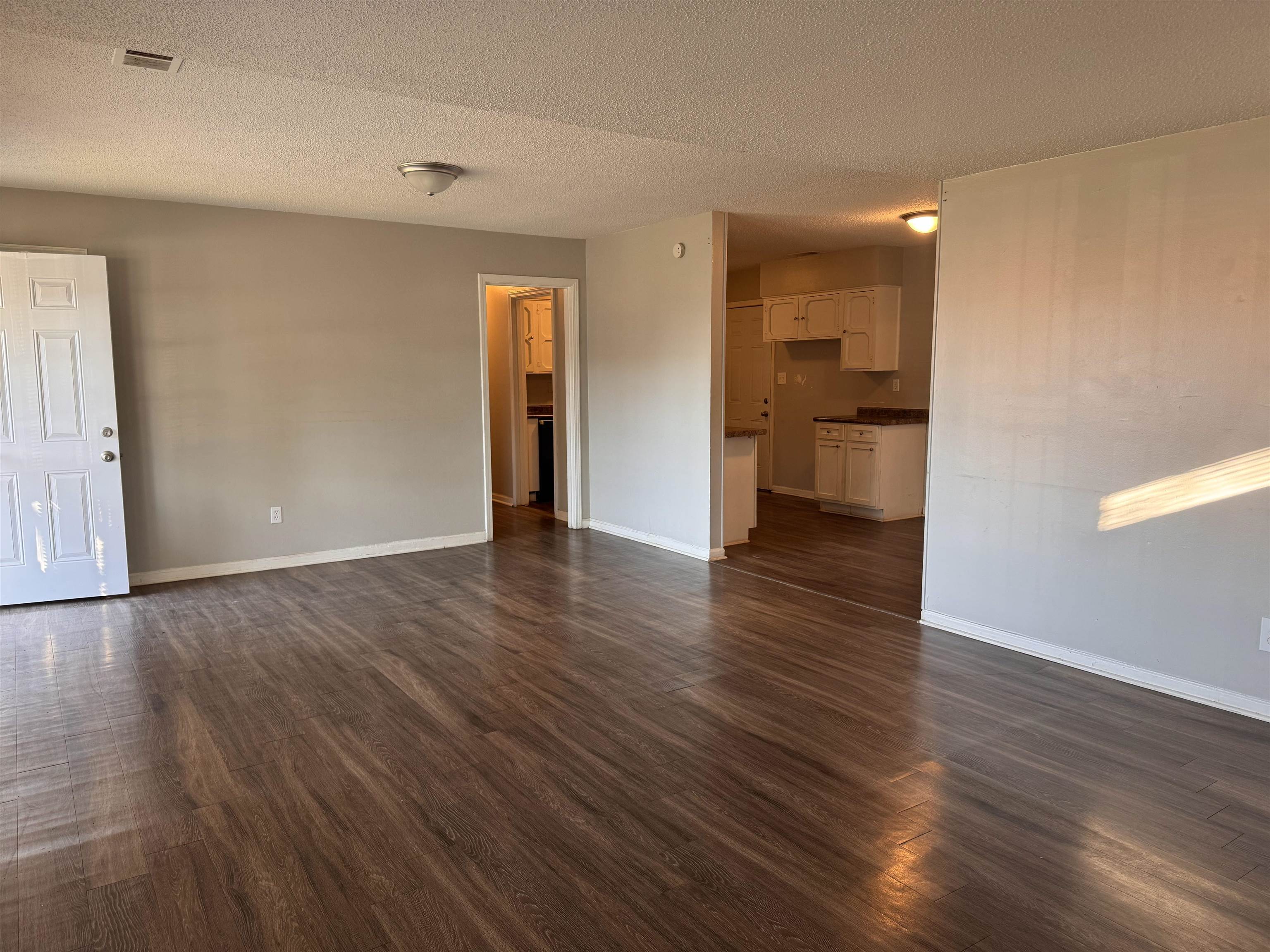 3788 Bishops Bridge Road Memphis, TN 38118 - Photo 3 of 22 a view of empty room with wooden floor