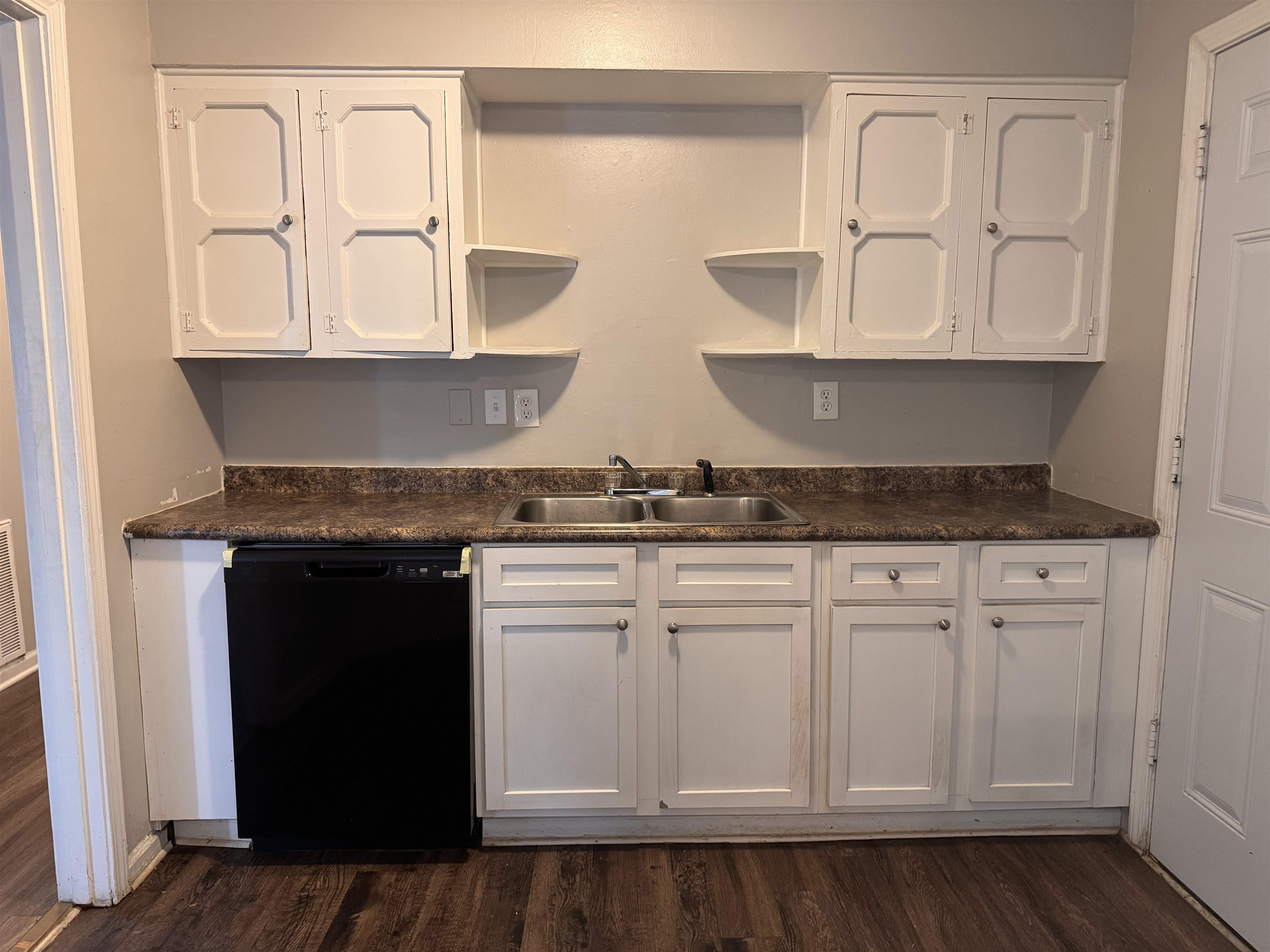 3788 Bishops Bridge Road Memphis, TN 38118 - Photo 7 of 22 a kitchen with white cabinets and sink