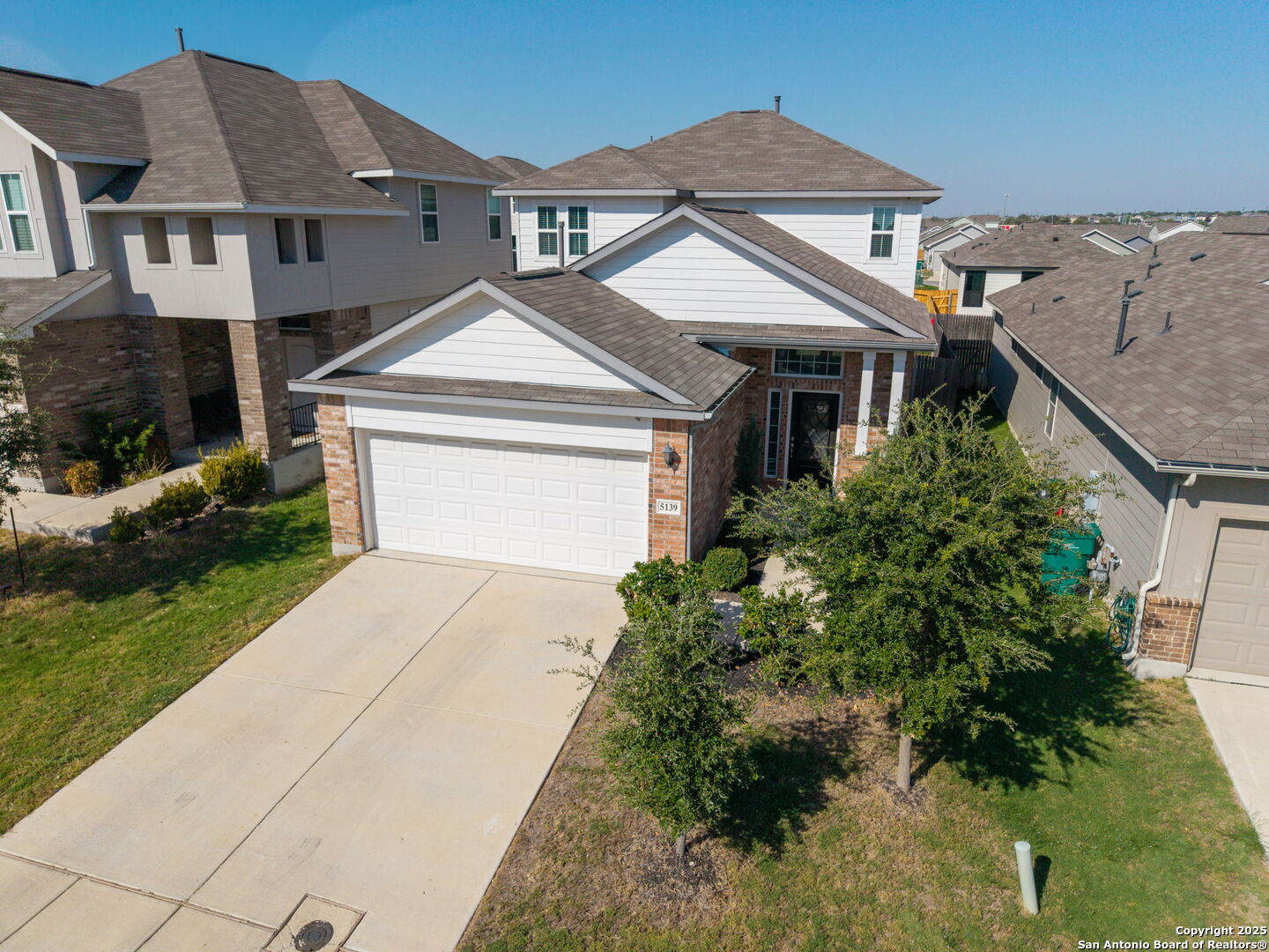 5139 Longhorn Converse, TX 78109 - Photo 5 of 46 a aerial view of a house with a yard and potted plants