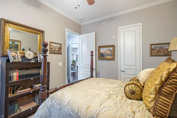 a bedroom with a bed and a cabinets
