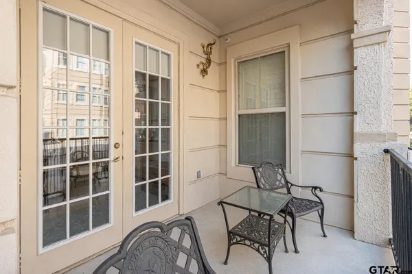 a view of a livingroom with furniture and front door