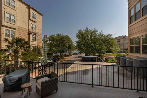 a view of a lake with a yard