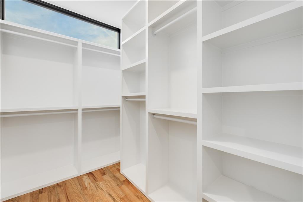 105 Georgia Avenue Southeast, Unit 1 Atlanta, GA 30312 - Photo 18 of 40 a view of walk in closet with empty racks