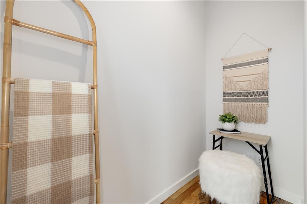 105 Georgia Avenue Southeast, Unit 1 Atlanta, GA 30312 - Photo 20 of 40 a room with a window and wooden floor