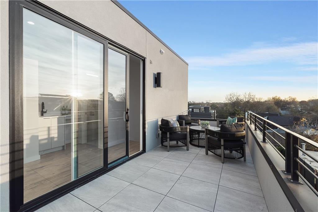105 Georgia Avenue Southeast, Unit 1 Atlanta, GA 30312 - Photo 27 of 40 a view of roof deck with furniture