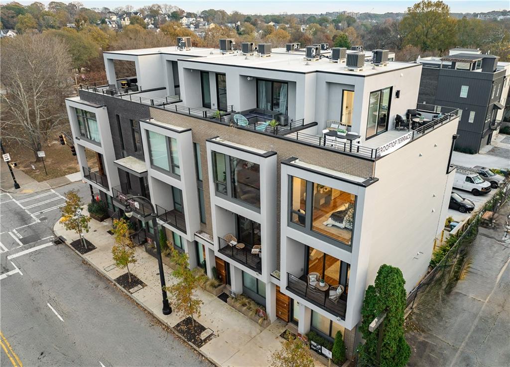 105 Georgia Avenue Southeast, Unit 1 Atlanta, GA 30312 - Photo 30 of 40 a view of a house with roof deck