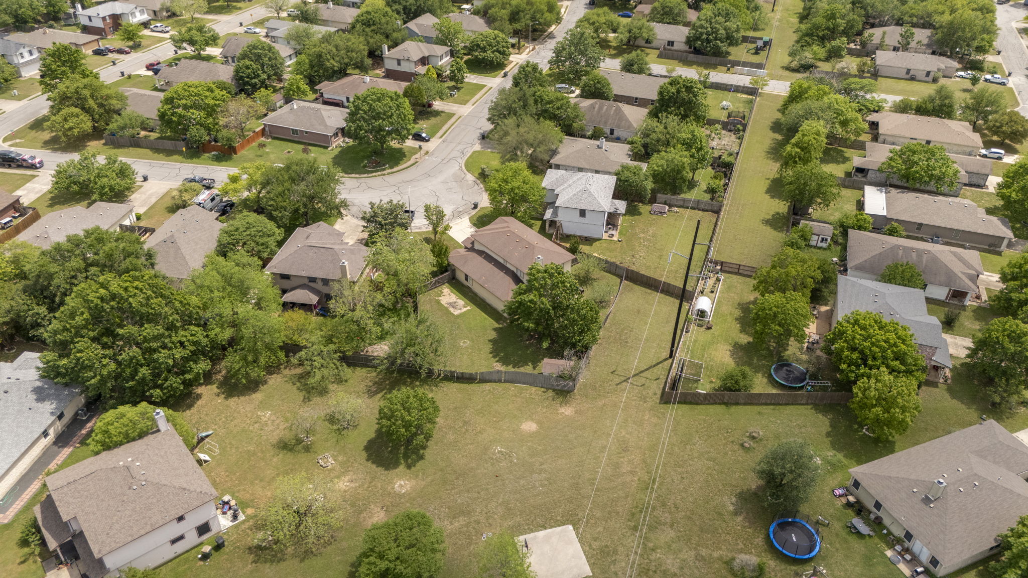 141 Sydney's Way Buda, TX 78610 - Photo 35 of 37 an aerial view of residential houses with outdoor space