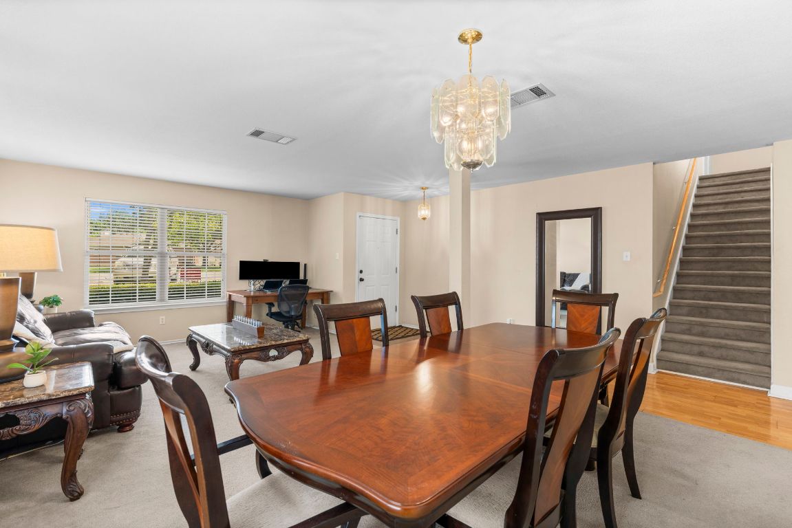141 Sydney's Way Buda, TX 78610 - Photo 7 of 37 a view of a dining room with furniture window and outside view