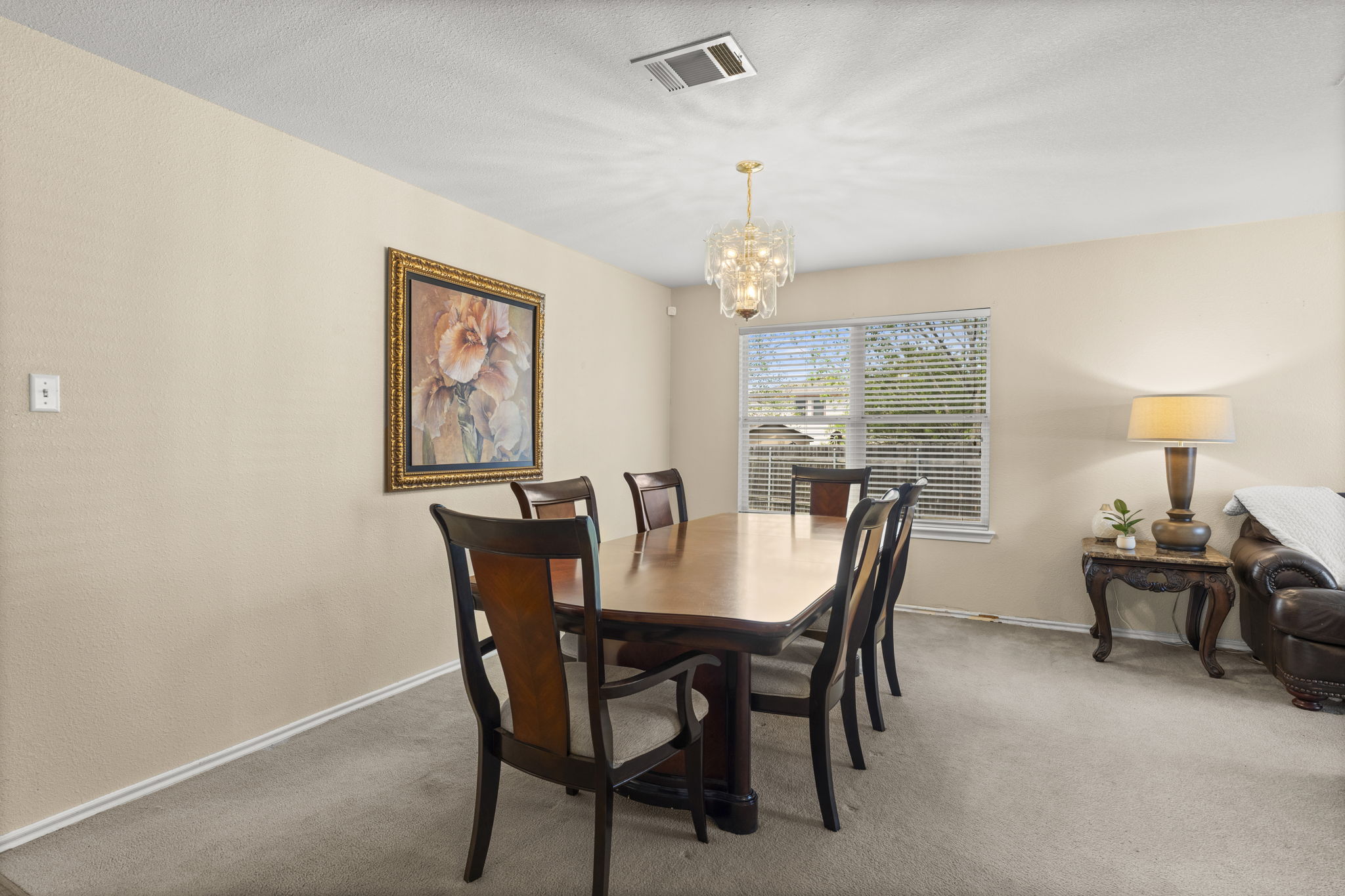 141 Sydney's Way Buda, TX 78610 - Photo 10 of 37 a view of a dining room with furniture window and outside view