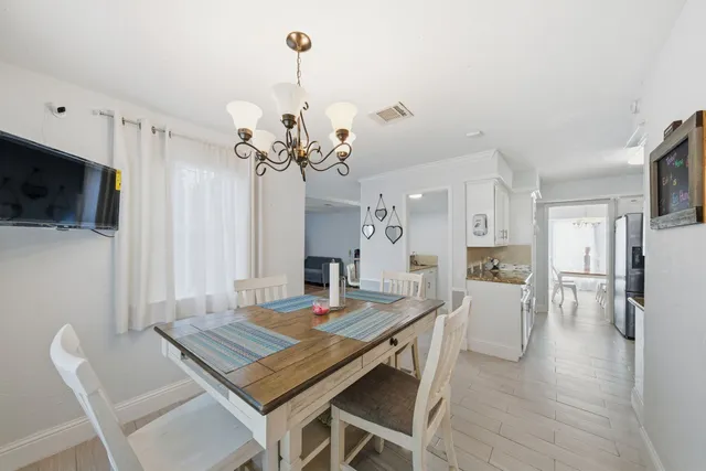 a view of a dining room with furniture
