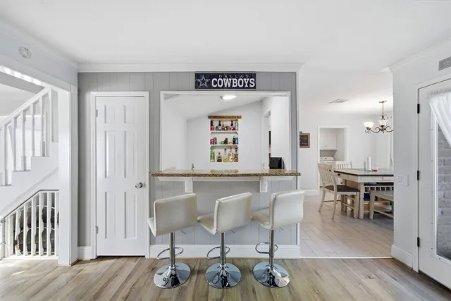 a view of a livingroom with furniture wooden floor and furniture