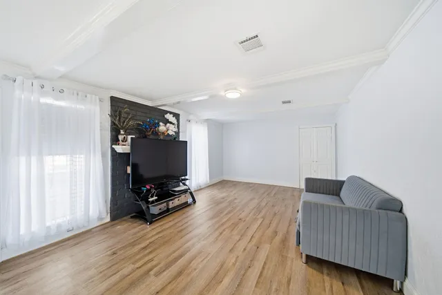 a view of livingroom with furniture and wooden floor