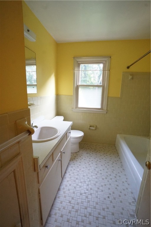 10110 Oldham Road Richmond, VA 23235 - Photo 21 of 26 a bathroom with a sink a toilet and tub