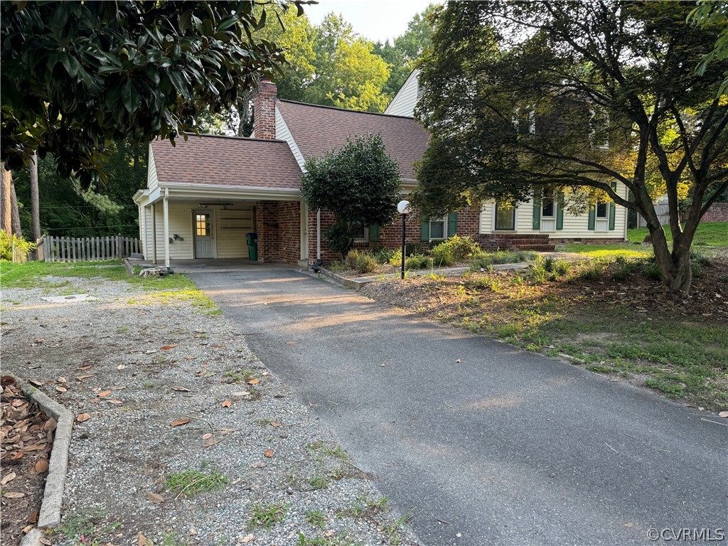 10110 Oldham Road Richmond, VA 23235 - Photo 3 of 26 a front view of a house with a yard