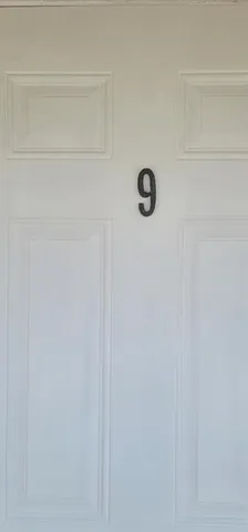 a view of yard from deck having outdoor seating