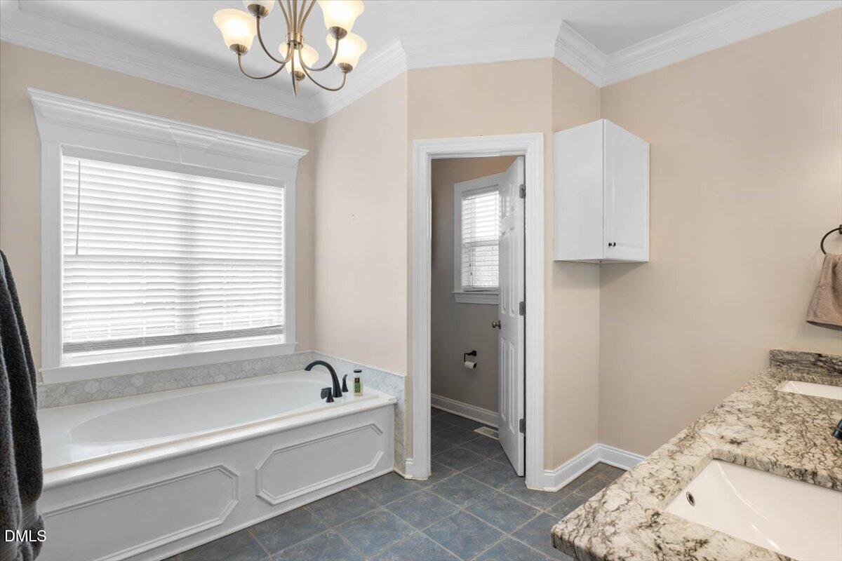 184 Travel Lite Drive Raleigh, NC 27603 - Photo 20 of 38 primary bath