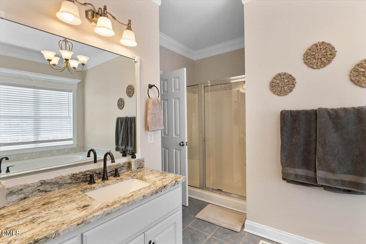 184 Travel Lite Drive Raleigh, NC 27603 - Photo 22 of 38 primary bath