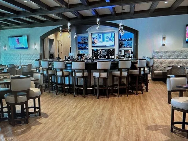 a group of chairs sitting in kitchen and dining room