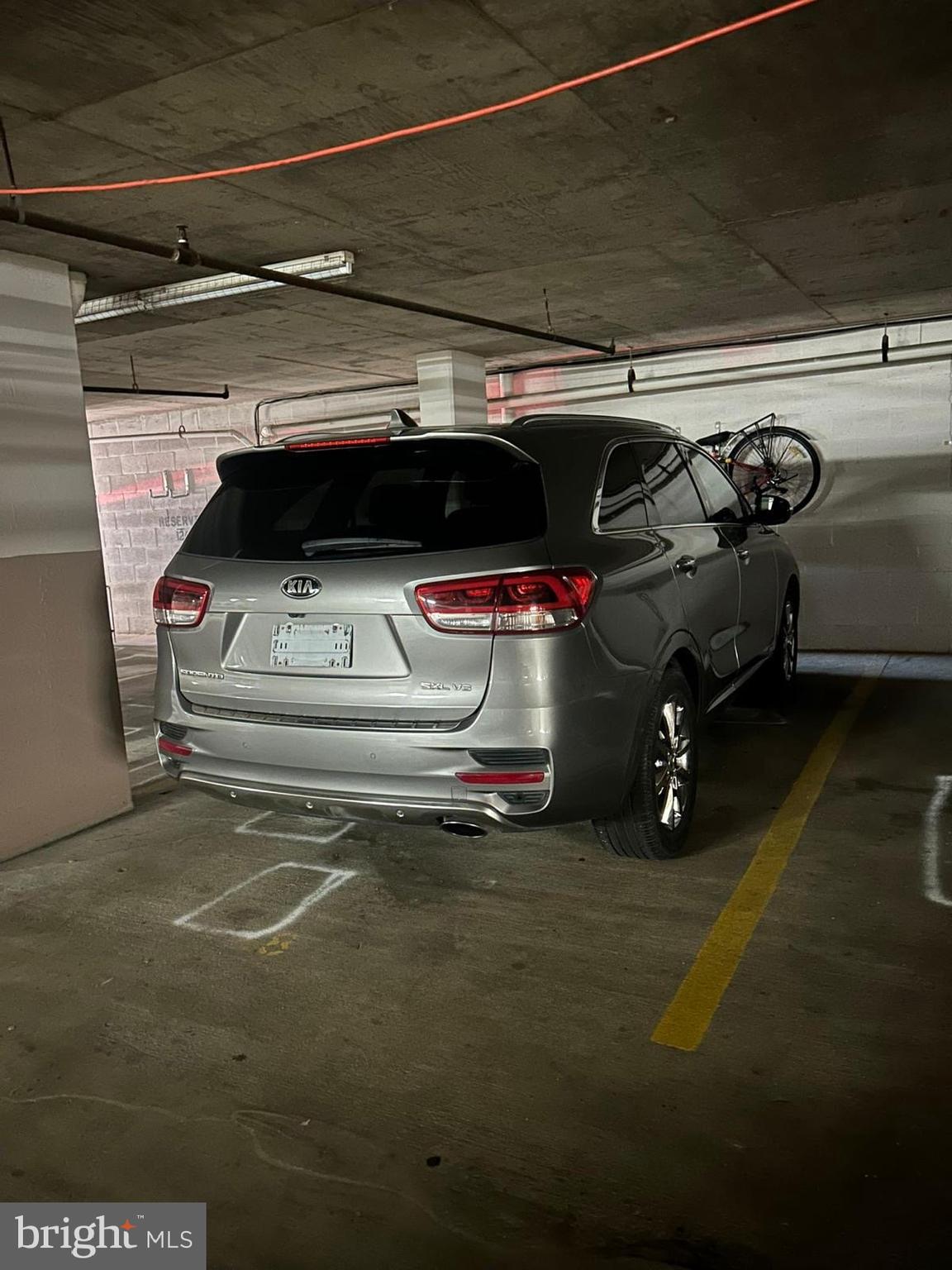 1301 North Courthouse Road, Unit 1610 Arlington, VA 22201 - Photo 27 of 41 a car parked in garage