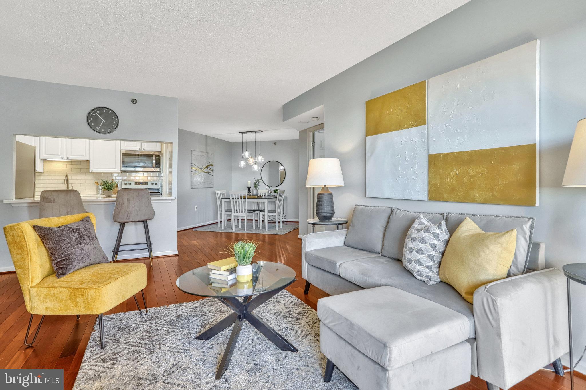 1301 North Courthouse Road, Unit 1610 Arlington, VA 22201 - Photo 6 of 41 a living room with furniture and a couch