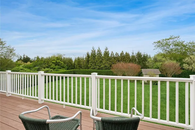 a view of a chair and a small yard