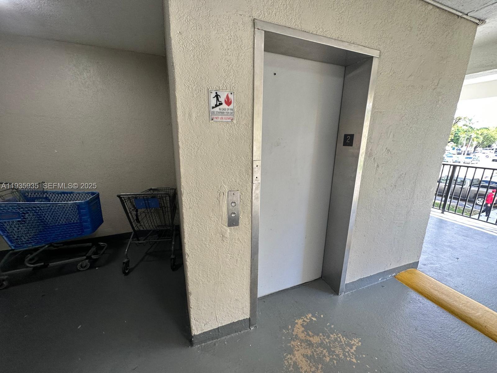 1875 West 56th Street, Unit 301 Hialeah, FL 33012 - Photo 5 of 17 a view of workspace with furniture and a window