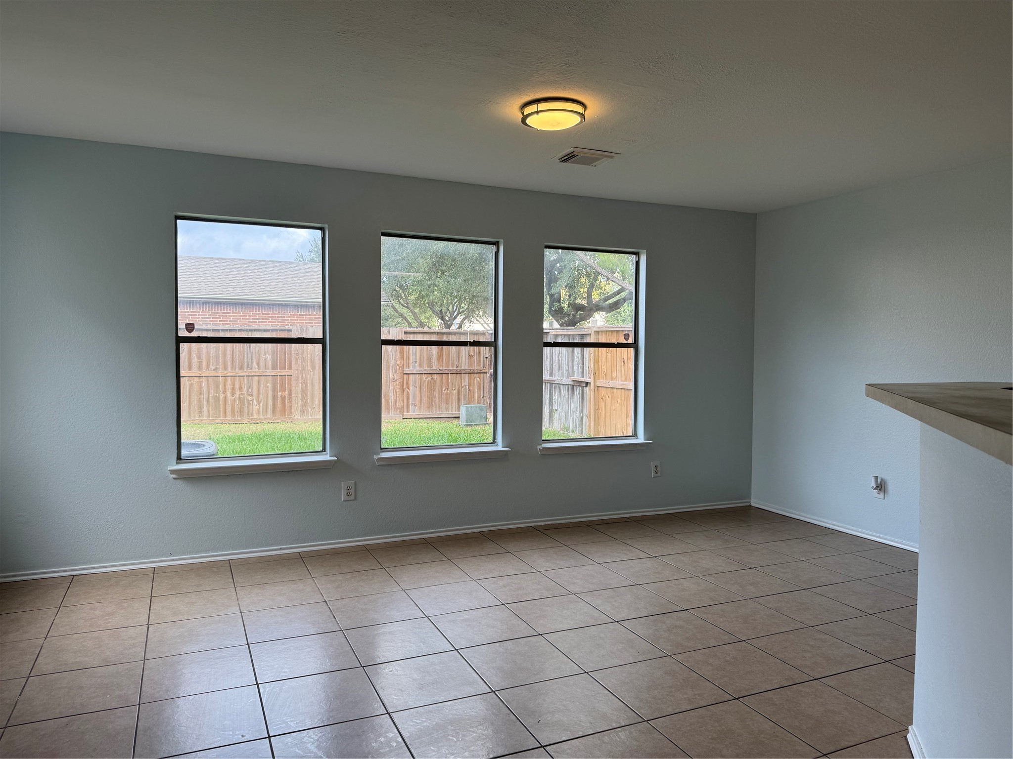 8111 Liberty Point Lane Humble, TX 77338 - Photo 5 of 14 an empty room with windows
