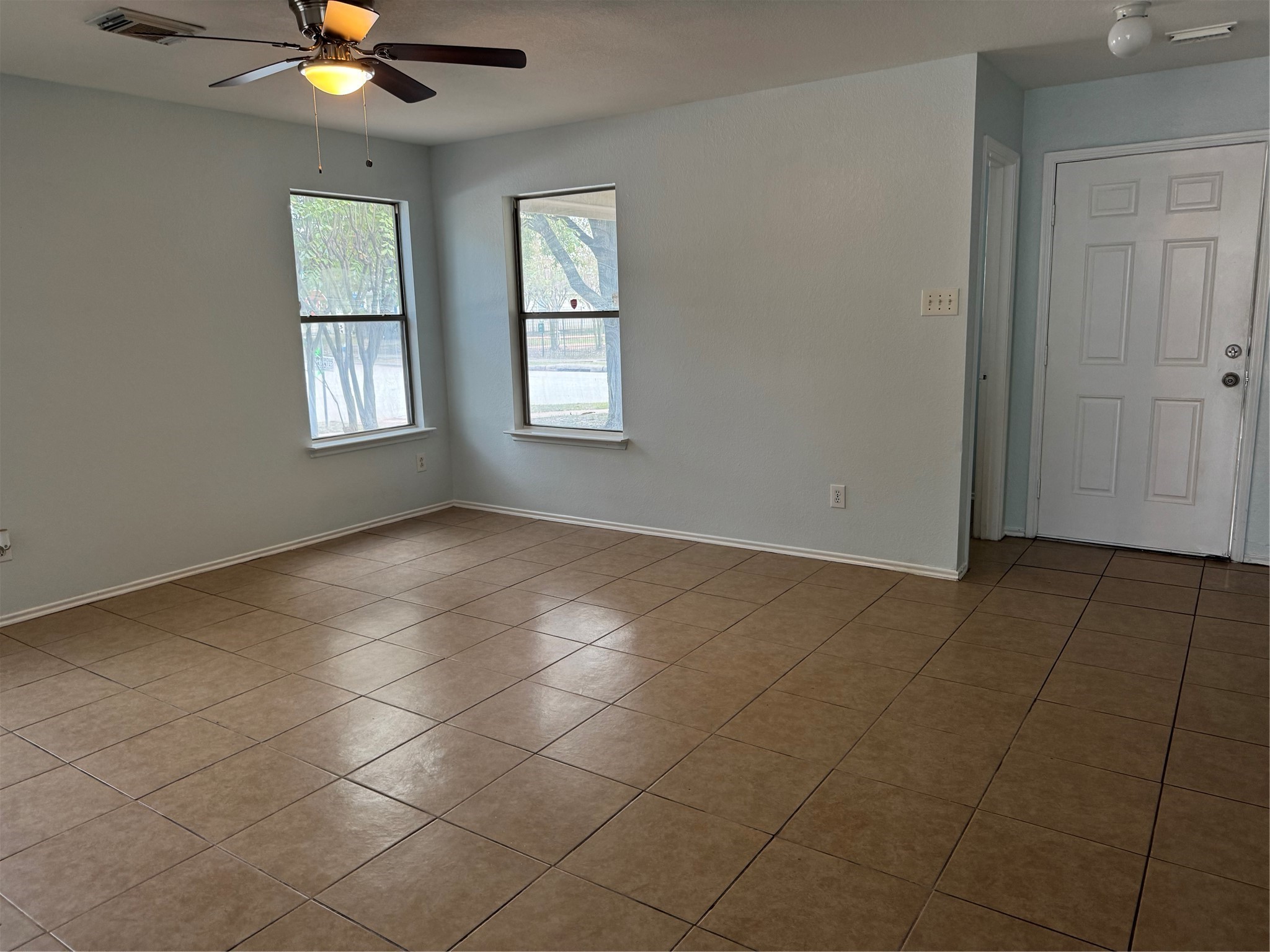 8111 Liberty Point Lane Humble, TX 77338 - Photo 6 of 14 a view of an empty room with a window