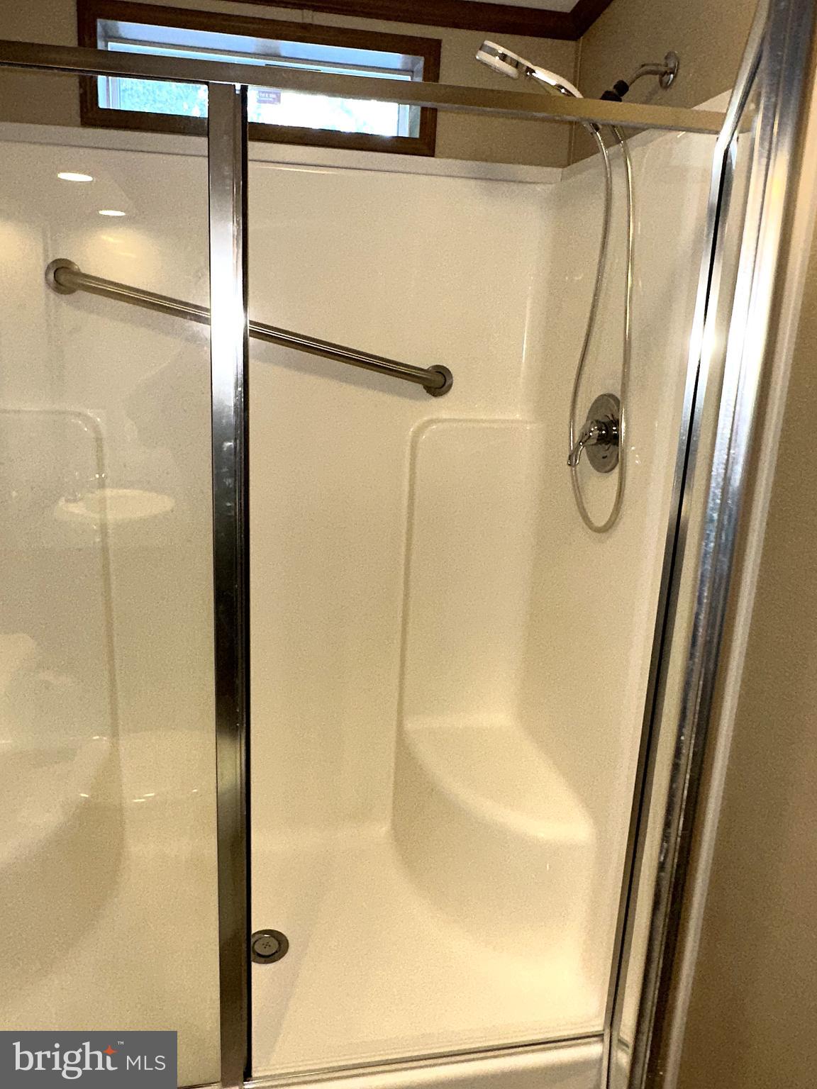 1277 Ritchie Highway, Unit 195 Arnold, MD 21012 - Photo 20 of 30 a bathroom with a shower