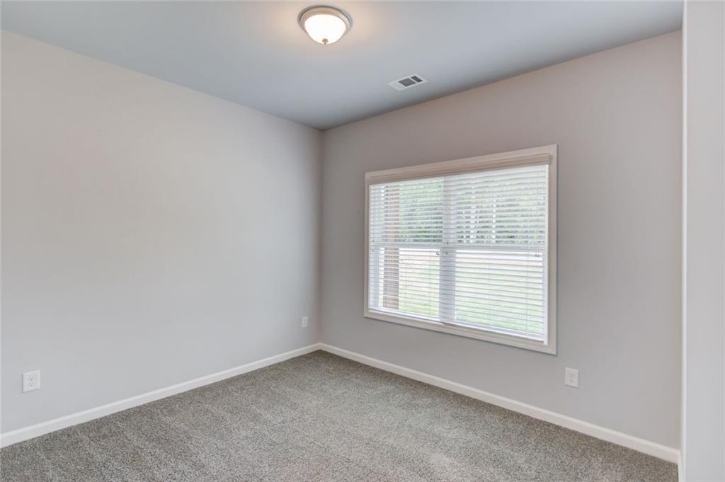 771 Dortch Road Eastanollee, GA 30538 - Photo 26 of 38 an empty room with a window