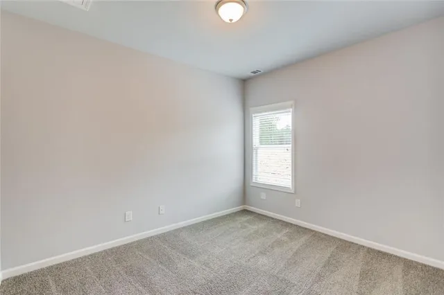 a view of empty room with window