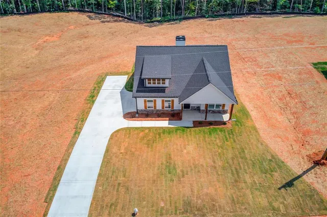 a view of house with outdoor space