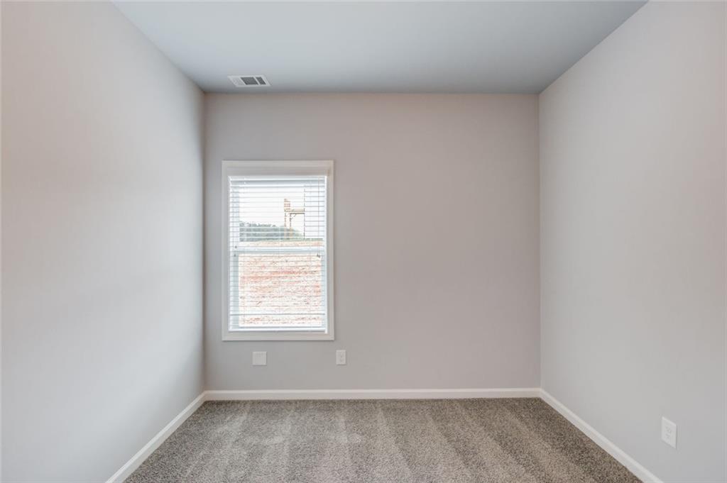 771 Dortch Road Eastanollee, GA 30538 - Photo 31 of 38 an empty room with a window