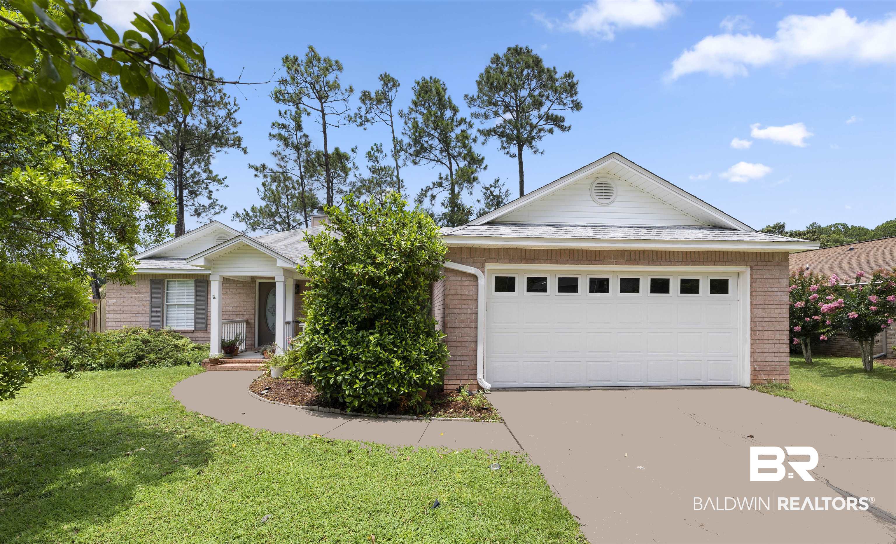 2898 Panama Circle Lillian, AL 36549 - Photo 1 of 23 Ranch-style home with a garage and a front lawn