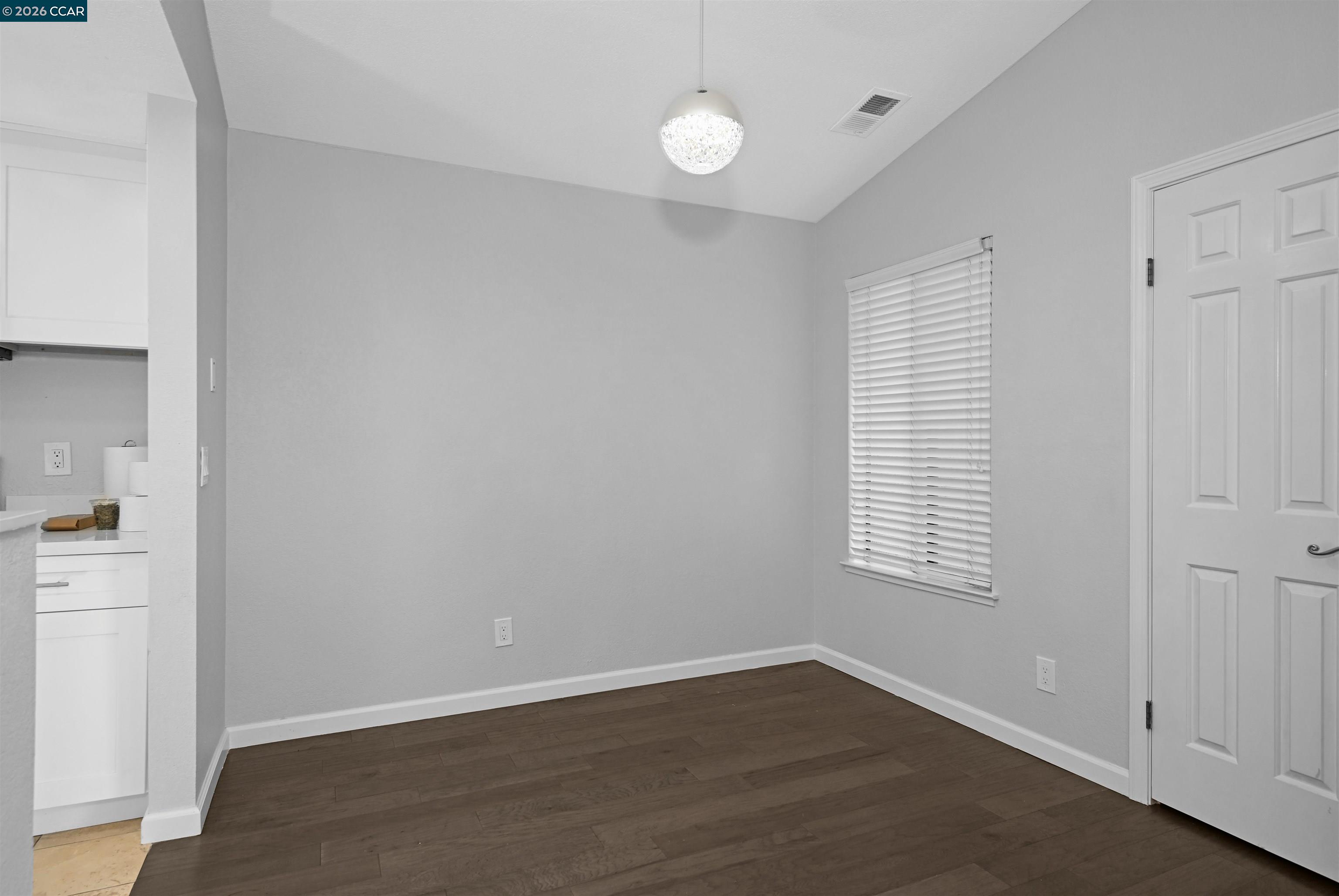 3659 Crow Canyon Road San Ramon, CA 94582 - Photo 12 of 26 an empty room with wooden floor and windows