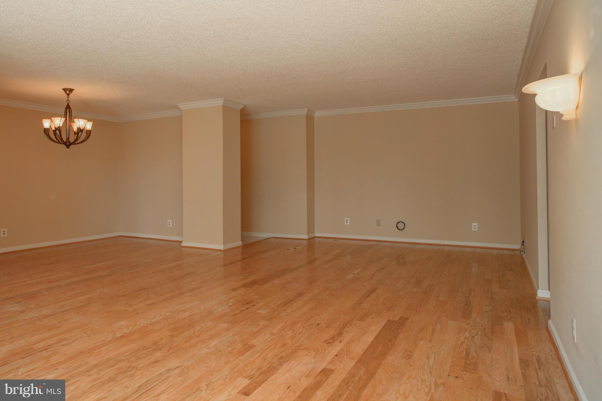 1800 Old Meadow Road, Unit 713 McLean, VA 22102 - Photo 13 of 27 a view of an empty room with a window