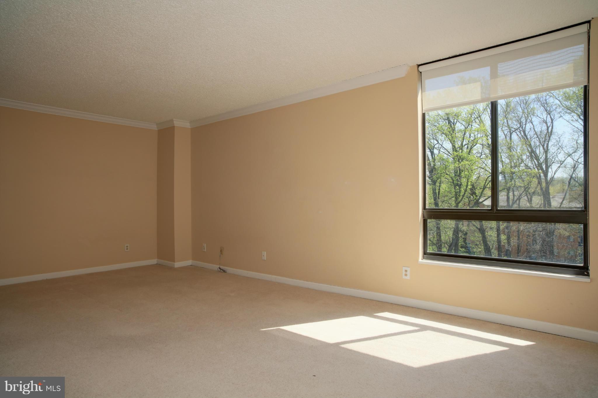 1800 Old Meadow Road, Unit 713 McLean, VA 22102 - Photo 17 of 27 a view of an empty room with a window