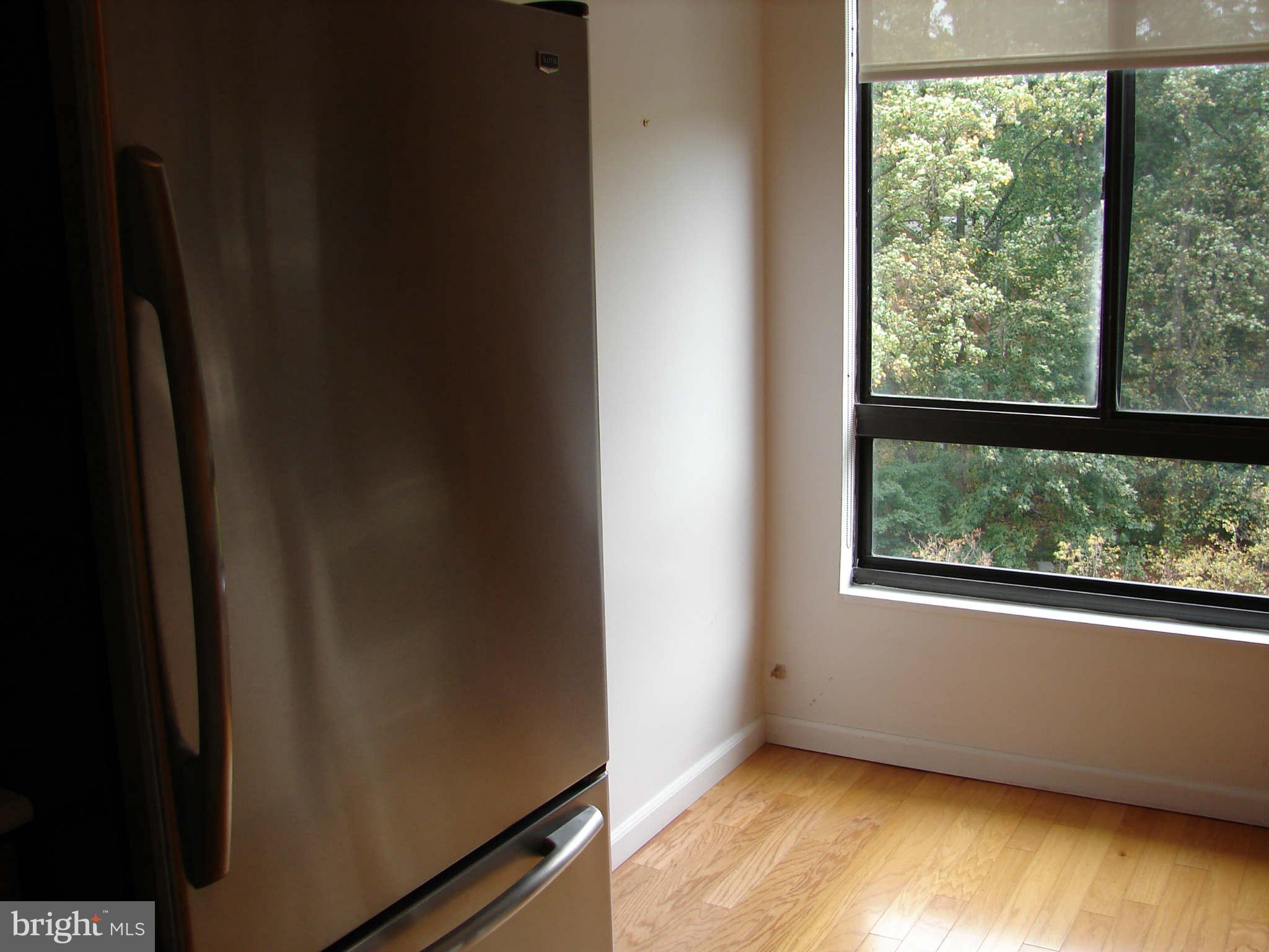 1800 Old Meadow Road, Unit 713 McLean, VA 22102 - Photo 4 of 27 a view of empty room with window