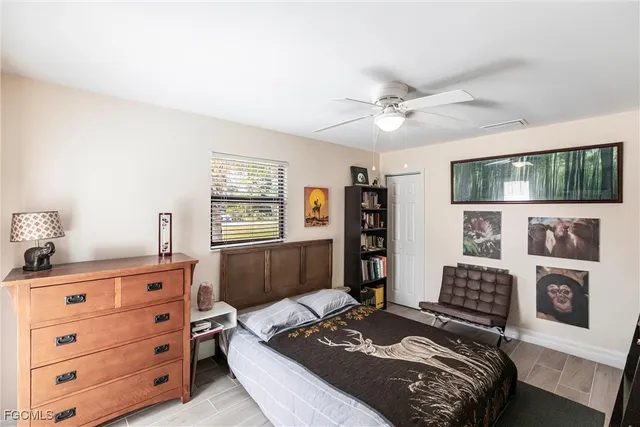 a bedroom with a bed and furniture