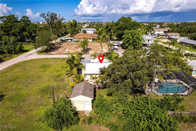 a view of a houses with a swimming pool